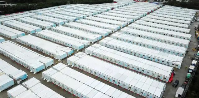 冲锋一线显继承！永利集团官网智能挖掘机助力长沙方舱医院建设